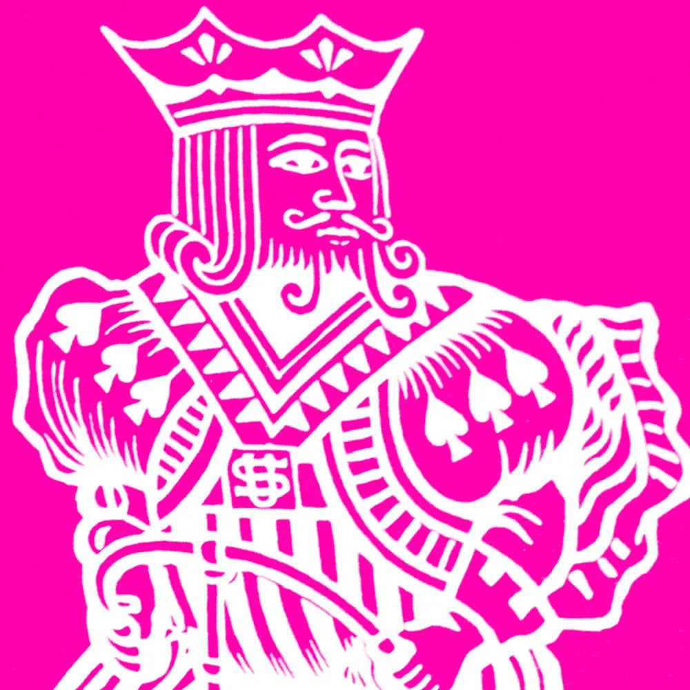 Bright pink background with white king face from pink bicycle playing cards by Magic Makers Inc for magic tricks